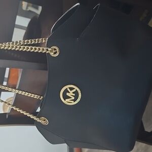 Michael Kors Elegant Black Shoulder Bag with Gold Accents, Jet Set Travel
